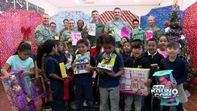 quot santas in blue quot donate christmas gifts to tucson kids quot santas in blue quot donate christmas gifts to tucson kids