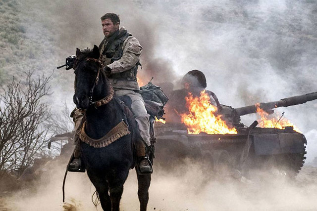 Chris Hemsworth takes on the Taliban in solid war film '12 Strong'